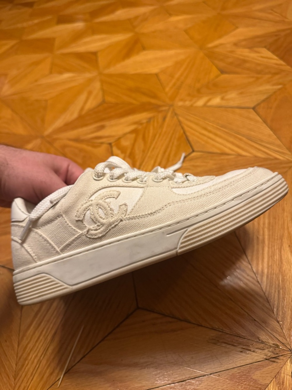 CHANEL Cream Canvas Low-Top Sneaker with Embroidered CC